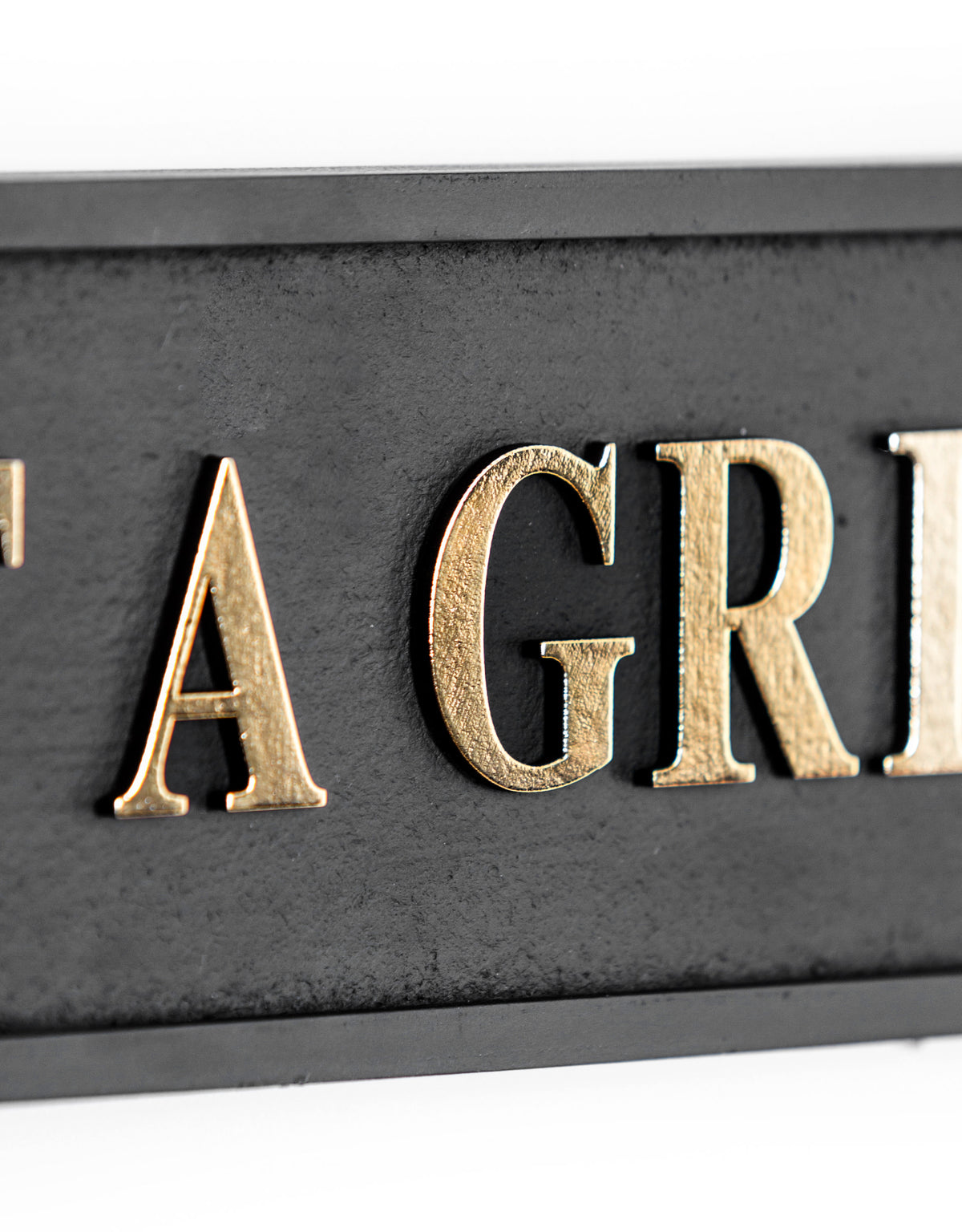 Black & Gold "Get A Grip" Wall Sign - RS104