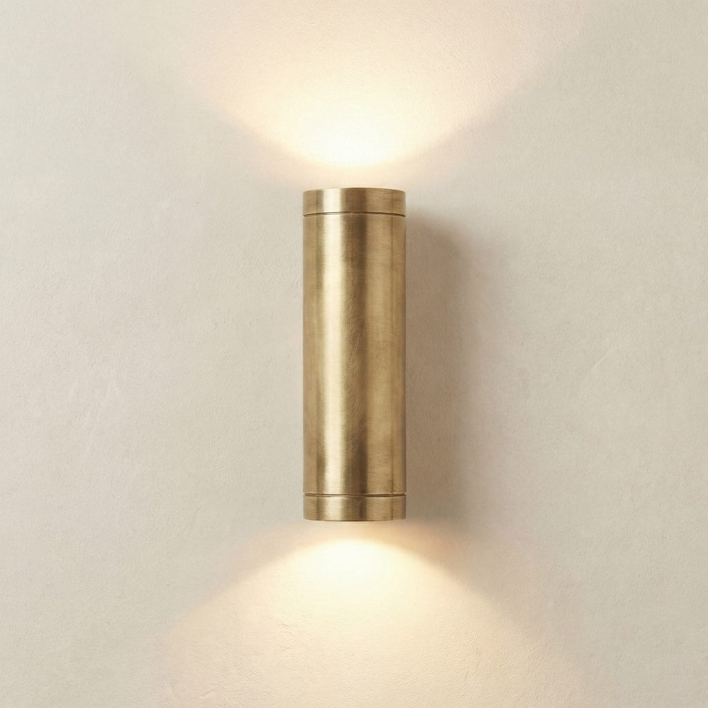 solid brass navigator up down wall light raw brass