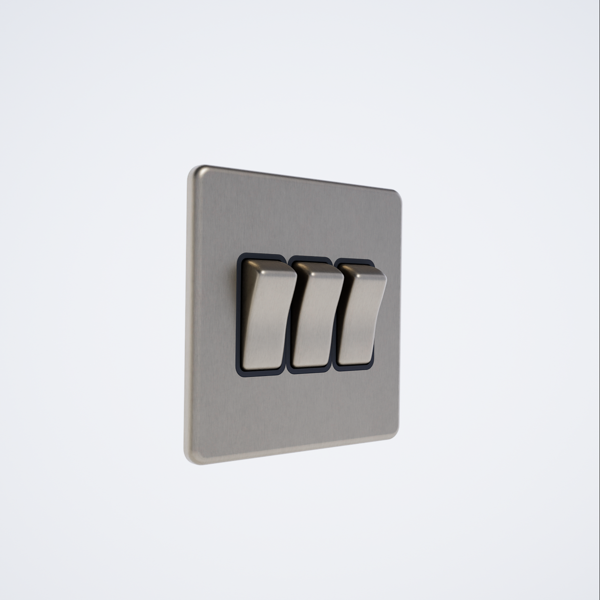 triple screwless light switch in brushed brass with black insert