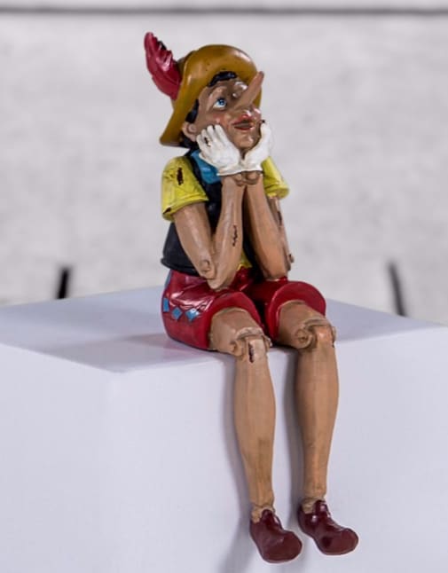 Antiqued Sitting Pinocchio Figure - RM54