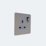 single screwless switches sockets in brushed steel with grey inserts