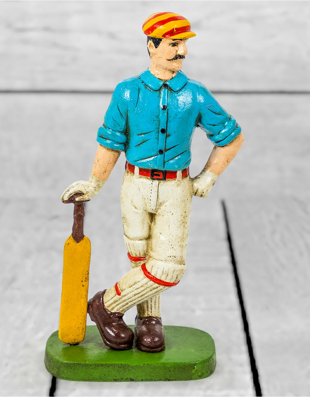 Cast Iron Antiqued Cricketer Door Stop - STM53