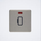 screwless 13A unswitched spur with neon in brushed steel with black inserts