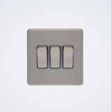 triple light switch in brushed steel with grey inserts
