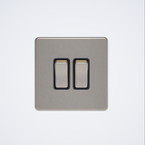 double screwless light switch in brushed chrome with black inserts