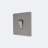 single screwless intermediate 10A switch in brushed steel with grey inserts