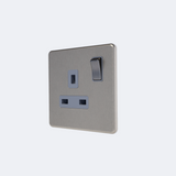 single screwless switches sockets in brushed steel with grey inserts