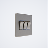 triple light switch in brushed steel with grey inserts