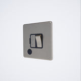 single screwless 13A switched spur + f/o in brushed steel with black inserts