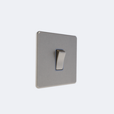 single screwless light switch in brushed steel with grey inserts